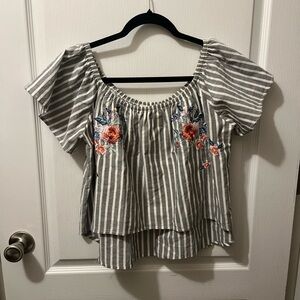 The Cove embroidered Top gray and white striped with floral embroidered details
